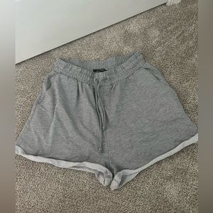 Grey sweat shorts with elastic tie